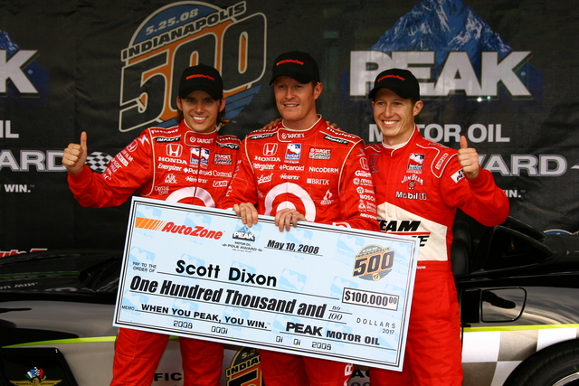 PEAK Motor Oil Pole Award winner Scott Dixon poses with the other front row members, Dan Wheldon (left) and Ryan Briscoe (right) after qualifications on Pole Day at the Indianapolis Motor Speedway. -- Photo by: Jim Haines