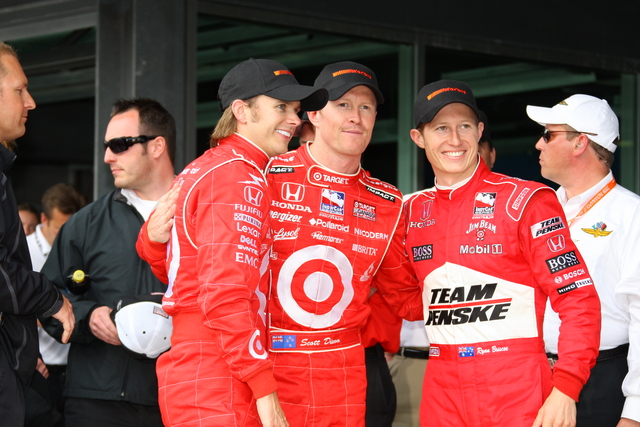 Dan Wheldon, Scott Dixon and Ryan Briscoe pose for photos after qualifications on Pole Day at the Indianapolis Motor Speedway. -- Photo by: Shawn Payne