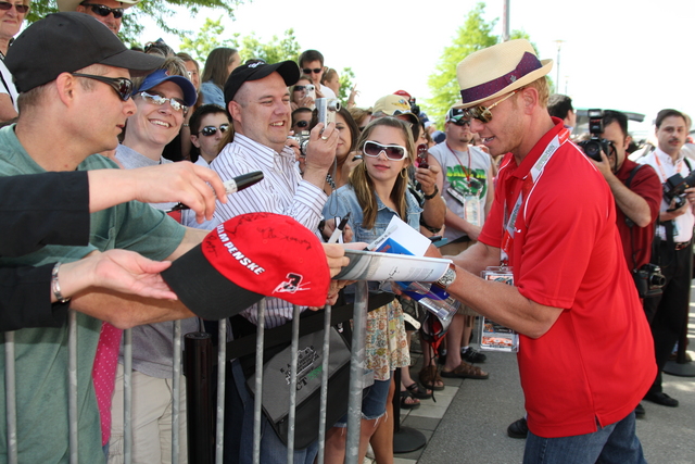 Actor Ian Ziering signs autographs on Race Day At the Indianapolis Motor Speedway. -- Photo by: Dana Garrett