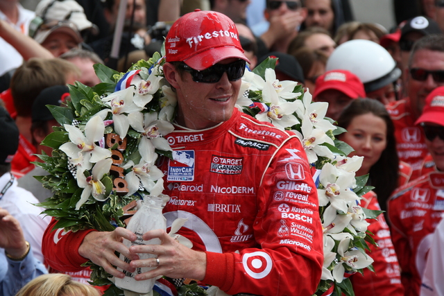 Scott Dixon after dumping milk on his head while celebrating his victory in the 92nd Indianapolis 500. -- Photo by: Dana Garrett
