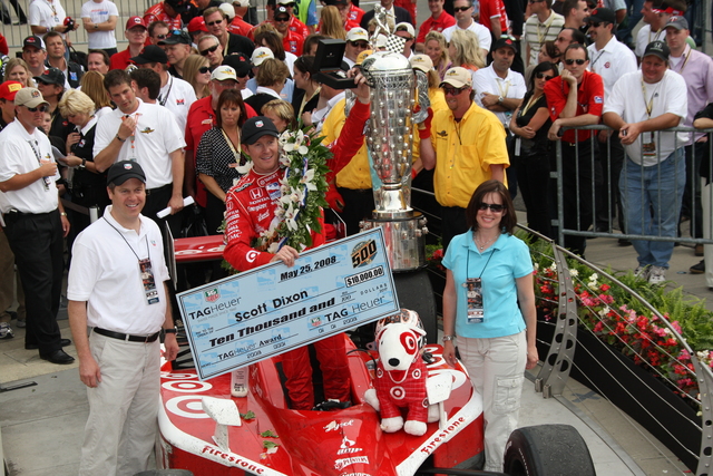 Scott Dixon receives a check from TAG Heuer after winning the 92nd Indianapolis 500. -- Photo by: Dana Garrett