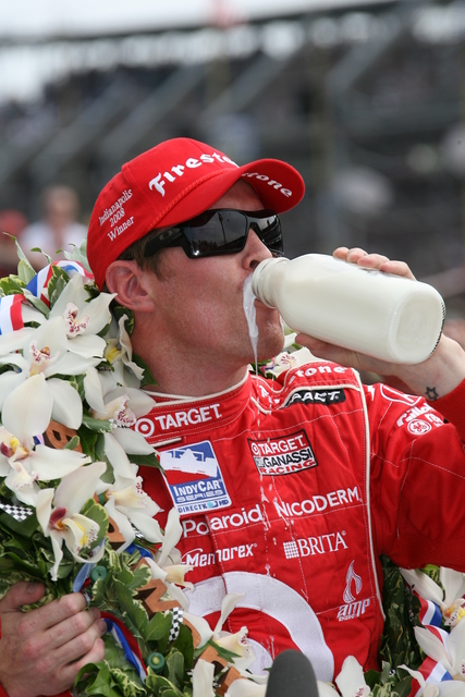 Scott Dixon takes a swig of milk after winning the 92nd Indianapolis 500. -- Photo by: Dan Helrigel