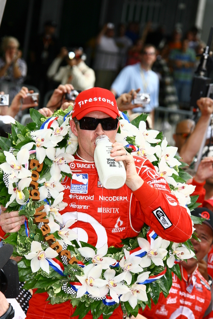 Scott Dixon takes a swig of milk following the 92nd Indianapolis 500. -- Photo by: Jim Haines