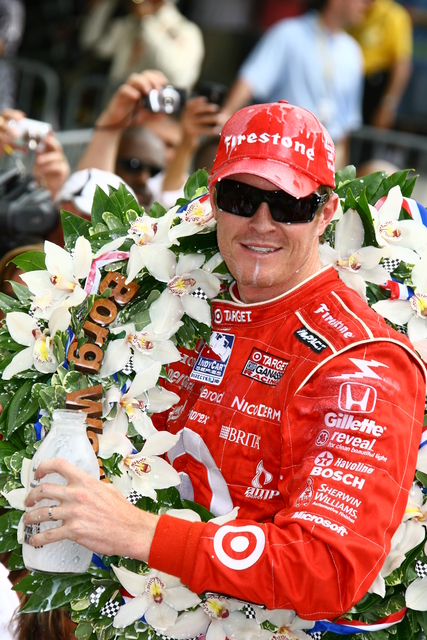 Target Chip Ganassi race car driver #9 Scott Dixon, is covered with victory milk after winning the 92nd Indianapolis 500. -- Photo by: Jim Haines