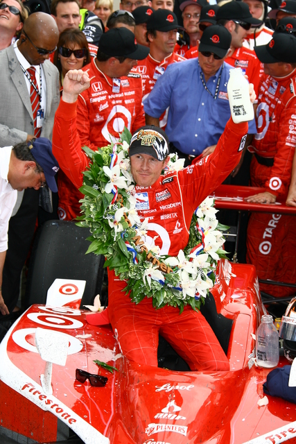 Scott Dixon gives a victory salute following his victory in the 92nd Indianapolis 500. -- Photo by: Jim Haines