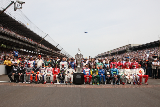 The starting field get their picture taken before the 92nd Indianapolis 500. -- Photo by: Ron McQueeney