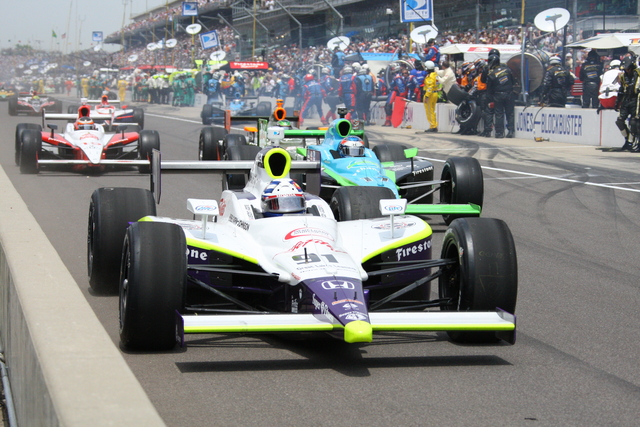Buddy Lazier leads a group out of the pits during the 92nd Indianapolis 500. -- Photo by: Shawn Payne