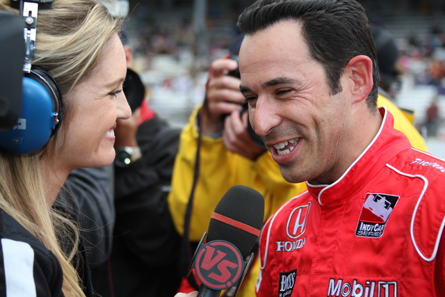 Helio Castroneves takes an interview after bumping his teammate Ryan Briscoe off the pole position. -- Photo by: Dana Garrett