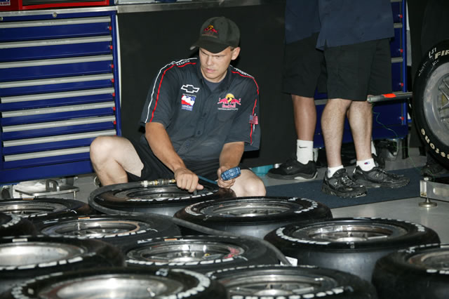 Red Bull Cheever Racing Crew member preparing for practice. -- Photo by: Ron McQueeney