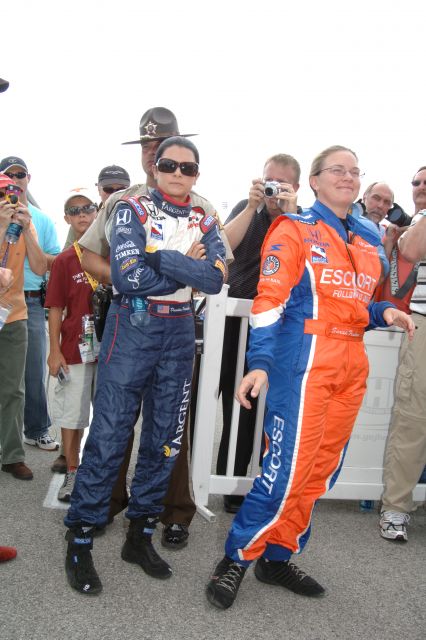 Danica Patrick, left, and Sarah Fisher wait for driver introductions. -- Photo by: Jim Haines