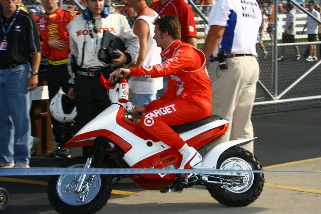 Dan Wheldon drives off after another unfortunate set back after the race. -- Photo by: Shawn Payne