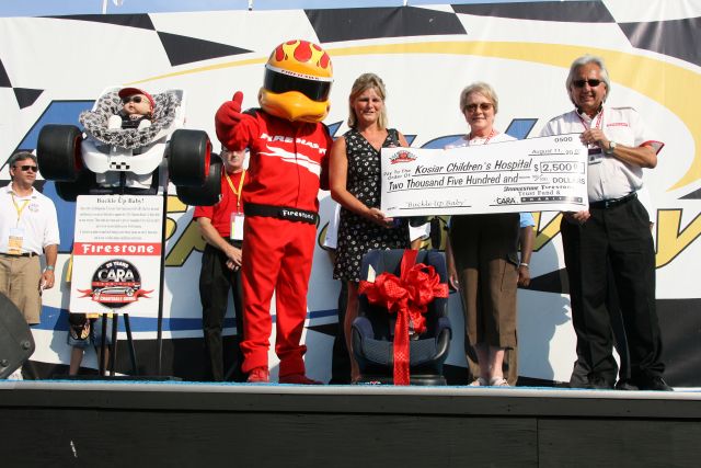 Kosiar Children's Hospital gets a check from CARA Charities at the Kentucky Speedway on race day. -- Photo by: Dana Garrett