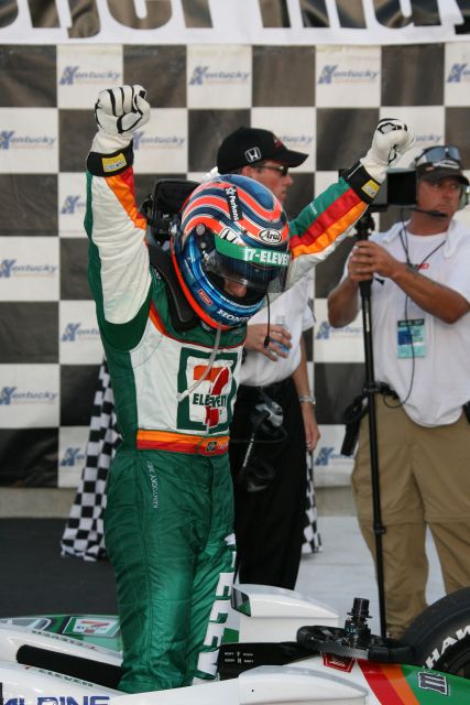 Tony Kanaan aclimbs out for his car after winning the Meijer Indy 300 at Kentucky Speedway. -- Photo by: Dana Garrett
