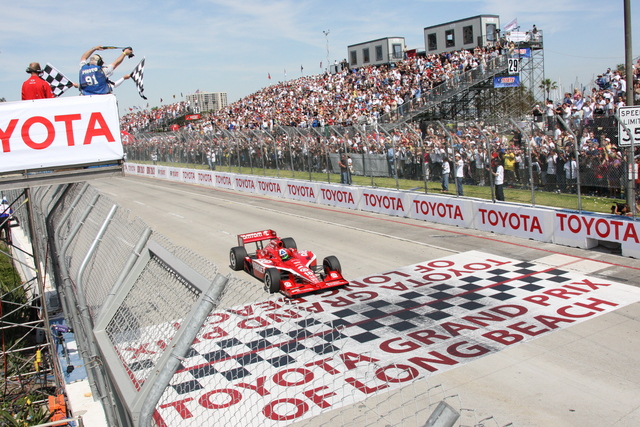 Dario Franchitti takes the checkered flag in the Toyota Grand Prix of Long Beach. -- Photo by: Ron McQueeney