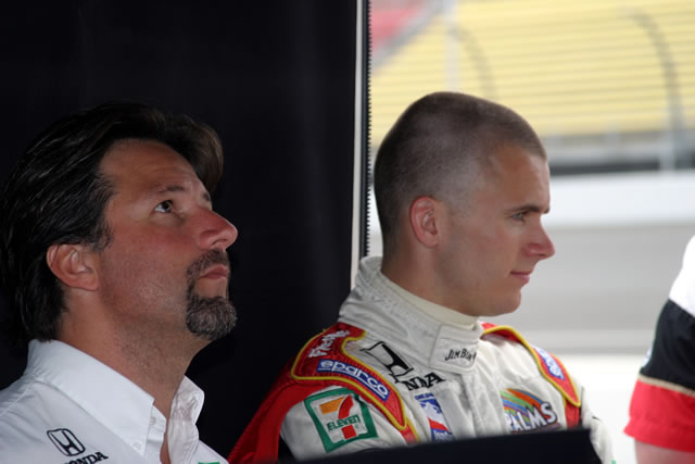Michael Andretti, left, watches team track telemetry with driver Dan Wheldon -- Photo by: Chris Jones