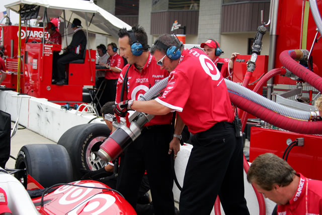 Target Chip Ganassi crew members practice pitstop during down time -- Photo by: Ron McQueeney
