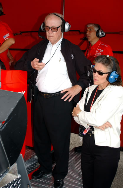 Pat Patrick, left, watches teams track times during practice session -- Photo by: Steve Snoddy