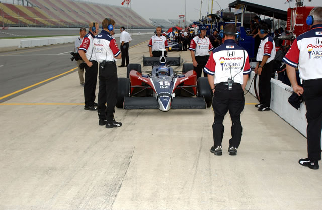Rahal-Letterman Racing driver Buddy Rice with crew in pits during practice session -- Photo by: Steve Snoddy