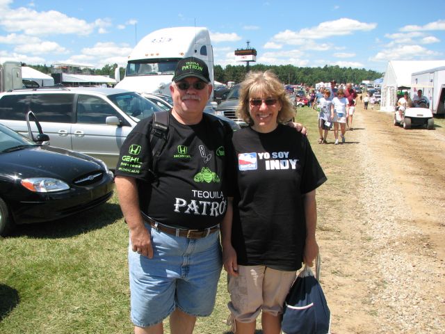 Scott Sharp Fan, Norm Grant, and his wife enjoy the race at Mid-Ohio. -- Photo by: Adrian Payne