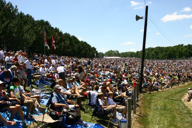 Fans pack into the track before the start of the Honda 200 at Mid-Ohio. -- Photo by: Jim Haines