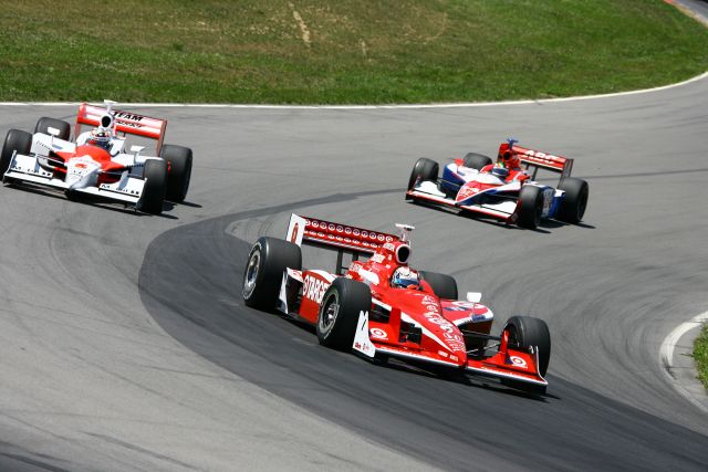 Scott Dixon leads Sam Hornish Jr. and Darren Manning during the Honda 200 at Mid-Ohio. -- Photo by: Jim Haines