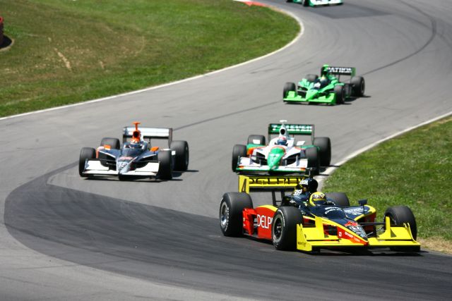 Vitor Meira leads AJ Foyt IV and Tony Kanaan during the Honda 200 at Mid-Ohio. -- Photo by: Jim Haines