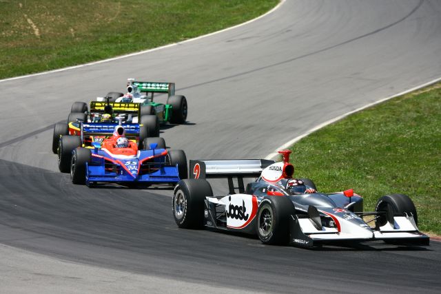 Tomas Scheckter leads Kosuke Matsuura during the Honda 200 at Mid-Ohio. -- Photo by: Jim Haines