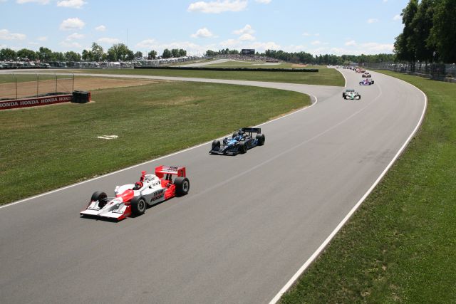Helio Castroneves leads Danica Patrick during the Honda 200 at Mid-Ohio. -- Photo by: Shawn Payne