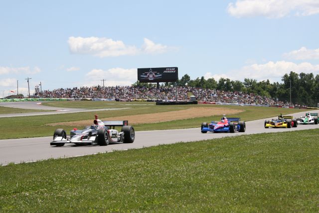 Tomas Scheckter leads Kosuke Matsuura during the Honda 200 at Mid-Ohio. -- Photo by: Shawn Payne