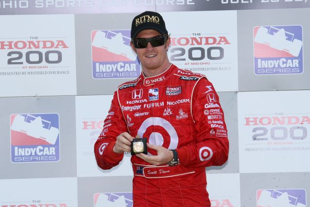 Scott Dixon and his Ritmo watch after winning the Honda 200 at Mid-Ohio. -- Photo by: Shawn Payne