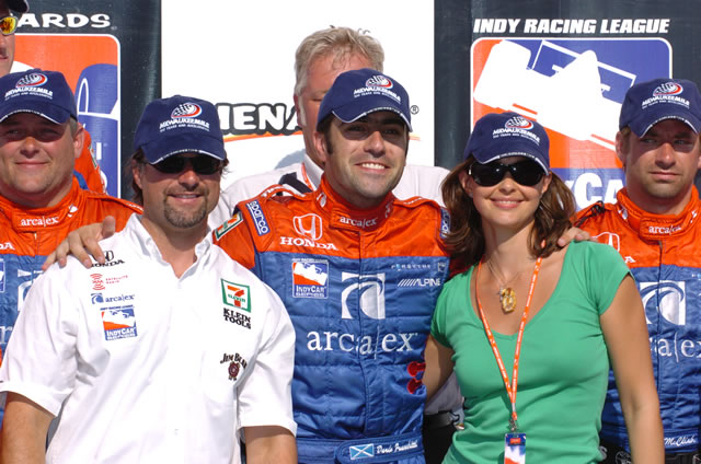 Micheal Andretti, left, Dario Franchitti, center, and Dario's wife Ashley Judd at victory celebration -- Photo by: Jim Haines