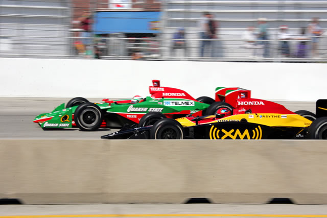 Close race action from # 7 Bryan Herta, front, and #5 Adrian Fernandez -- Photo by: Ron McQueeney
