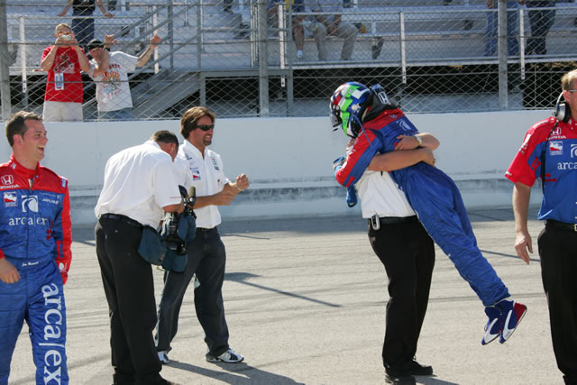 Andretti Green driver Dario Franchitti, center, celebrates victory with teammates -- Photo by: Ron McQueeney