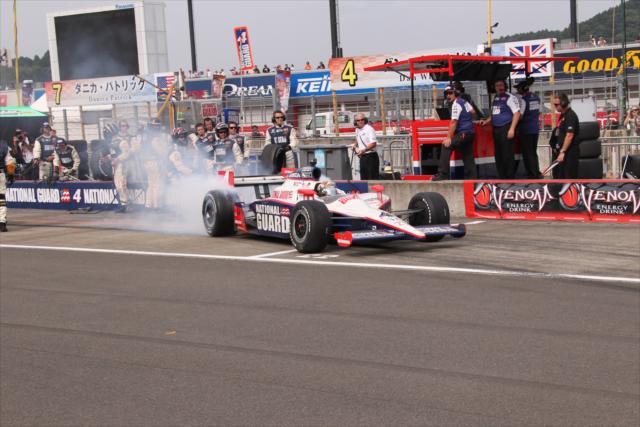Dan Wheldon exits the pit box after a stop on pit lane -- Photo by: Ron McQueeney