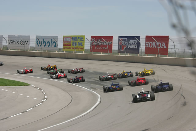 Late race action entering turn one -- Photo by: Ron McQueeney