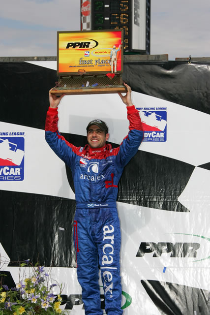 #27 ArchEx driver, Dario Franchitti celebrates winning the Pikes Peak Honda Indy 225 -- Photo by: Ron McQueeney