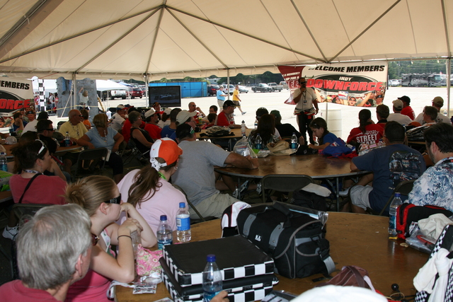 Jack Arute speaks with members of the Indy Downforce Club on race day at Richmond. -- Photo by: Chris Jones