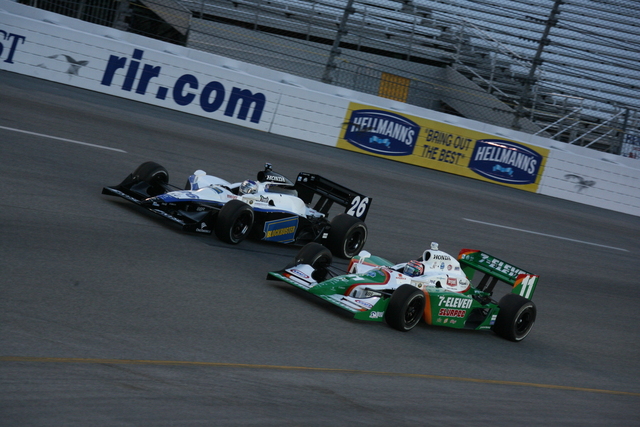 #26 Marco Andretti and #11 Tony Kanaan battle it out on track during the SunTrust Indy Challenge at Richmond International Raceway. -- Photo by: Chris Jones