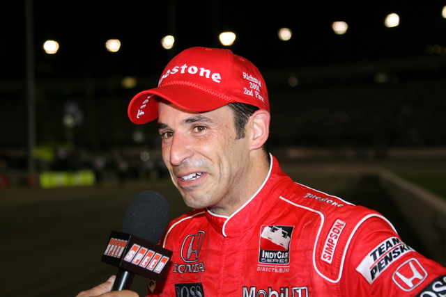 #3 Helio Castroneves speaks with media members after placing 2nd in the SunTrust Indy Challenge at Richmond International Raceway. -- Photo by: Chris Jones