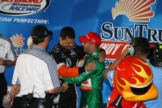 Jaime Camara congratulates Tony Kanaan in victory circle on race day at Richmond. -- Photo by: Shawn Payne