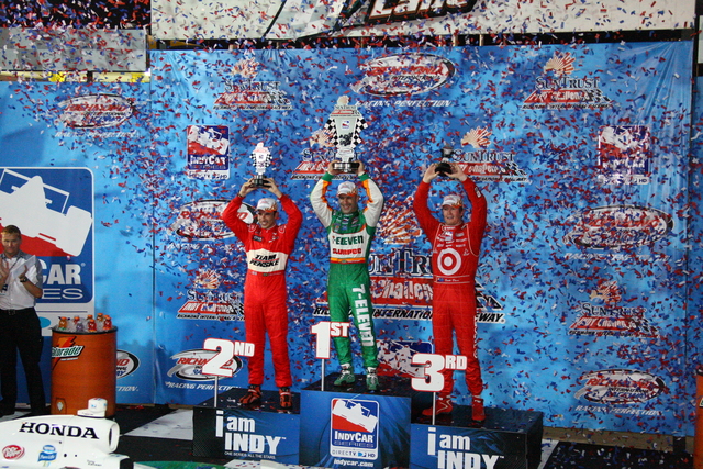Helio Castroneves, Tony Kanaan and Scott Dixon on the podium on race day at Richmond. -- Photo by: Shawn Payne