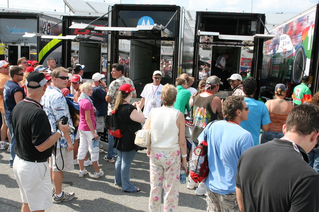 Fans hang out in front of the drivers transporters, hoping to catch a glimpse of their favorite driver before the start of the SunTrust Indy Challenge at Richmond. -- Photo by: Steve Snoddy