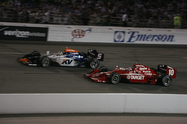 No. 5 Oriol Servia and No. 10 Dan Wheldon on track on race day at Richmond. -- Photo by: Steve Snoddy