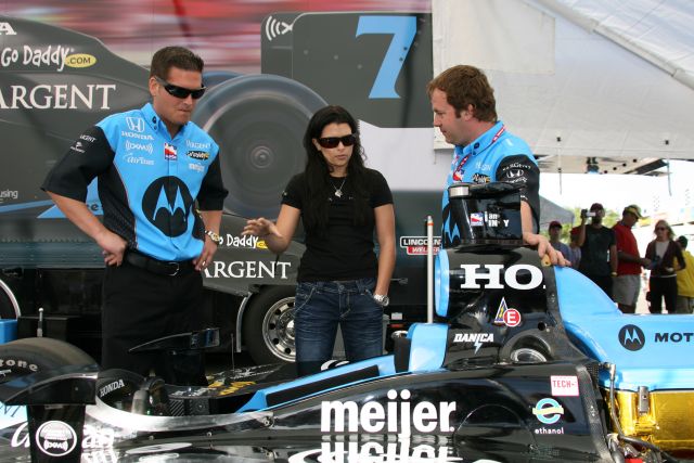 Danica Patrick and her crew go over changes to the car one last time before the race. -- Photo by: Dana Garrett