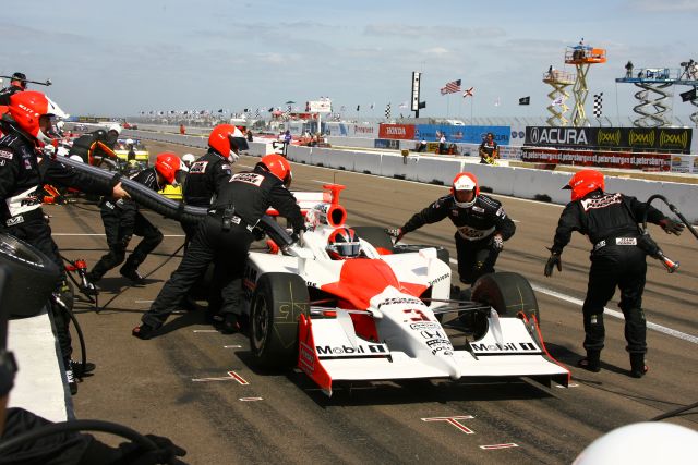 Helio Castroneves taking a pit stop. -- Photo by: Jim Haines
