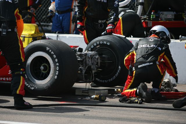 Panther Racing fixing their car in the pit stop at the Honda Grand Prix of St. Petersburg Race. -- Photo by: Shawn Payne