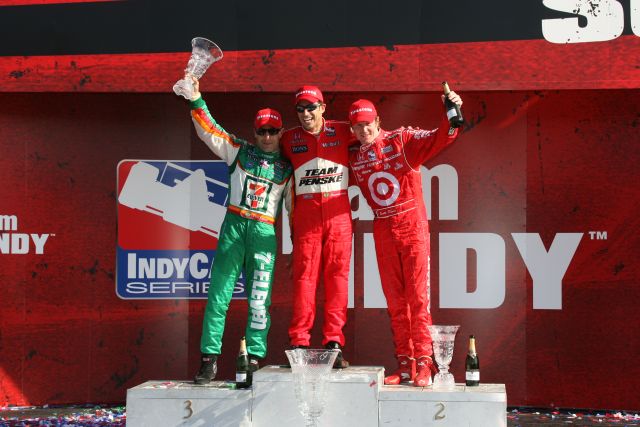 Tony Kanaan, left, Helio Castroneves and Scott Dixon share the podium -- Photo by: Shawn Payne