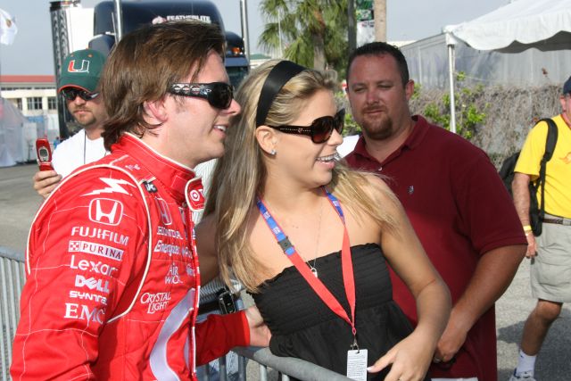Dan Wheldon poses for photos with fans at St. Petersburg. -- Photo by: Chris Jones