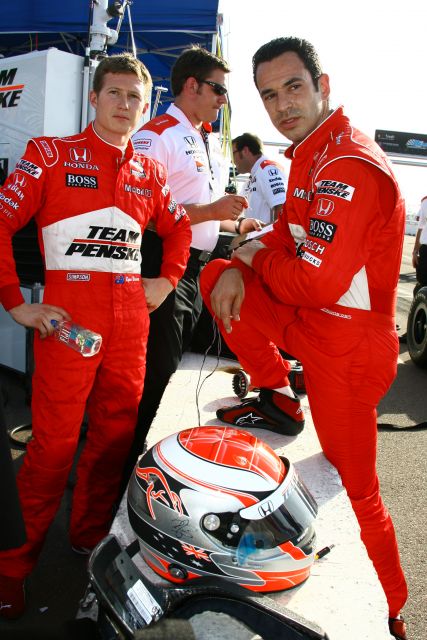 Teammates, Ryan Briscoe and Helio Castroneves, talk after practice at St. Petersburg. -- Photo by: Jim Haines