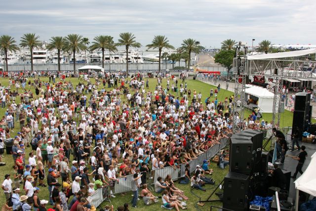 Race fans listen to concert during pre-race festivities. -- Photo by: Chris Jones